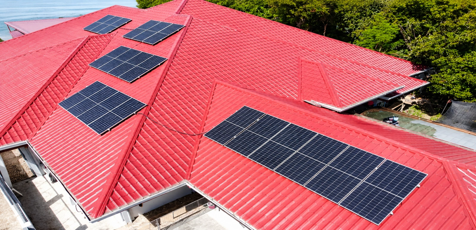 11kW N-Type bifacial solar panels installed on a red metal rooftop of a Philippine island resort